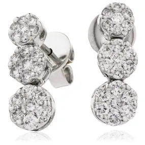 DIAMOND CLUSTER DROP EARRINGS IN 18K WHITE GOLD