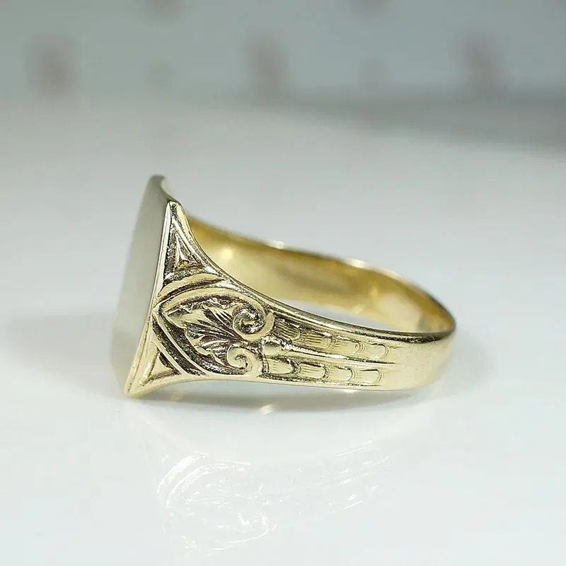 Elaborate Foliate Engraved Gold Signet Ring